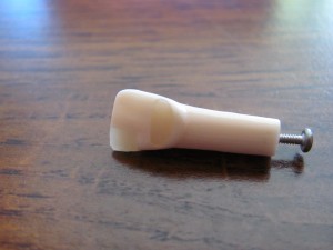 A sample plastic tooth